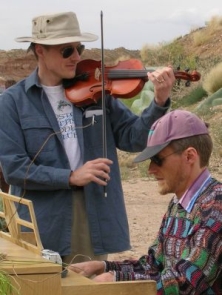 Lance playing fiddle with Lyle